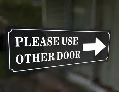 eSplanade Please USE Other Door/Different Door Sign Sticker Decal - Easy to Mount Weather Resistant Long Lasting Ink Size (9" x 3")